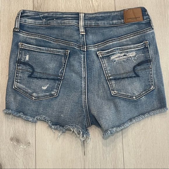 AMERICAN EAGLE Next Level Stretch Hi-Rise Shortie Distressed Blue Jean Shorts - Picture 9 of 9